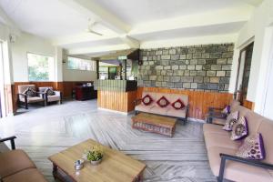 Posezení v ubytování Hotel M&D Suites