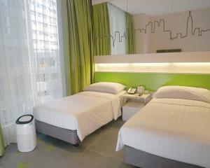 Cama o camas de una habitación en Dorsett Tsuen Wan, Hong Kong