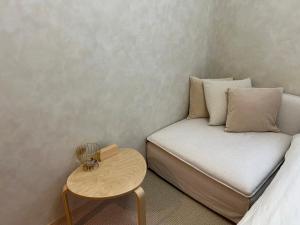 Ein Bett oder Betten in einem Zimmer der Unterkunft SANDBoX