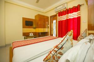 TV a/nebo společenská místnost v ubytování Hotel O Gitanjali Inn