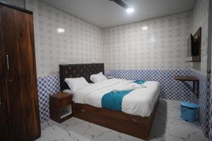 Ένα ή περισσότερα κρεβάτια σε δωμάτιο στο Nexus Corporate Stay