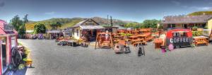 a model of a small town with tables and buildings at Sawmillers Wagon Gateway to Tekapo and the MacKenzie District in Burkes Pass +5 photos
