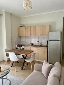 Kuchyň nebo kuchyňský kout v ubytování Sunny apartment