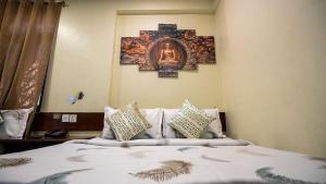 Voodi või voodid majutusasutuse Hotel Shree Tara toas