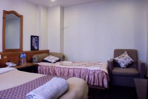 Voodi või voodid majutusasutuse Hotel Shree Tara toas
