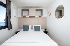 Posteľ alebo postele v izbe v ubytovaní Arena Stupice Camping Homes