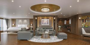 a bedroom with a bed and a living room at Paradise Legacy Cruise Halong in Ha Long +44 photos