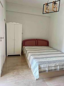 Ένα ή περισσότερα κρεβάτια σε δωμάτιο στο Sunny studio