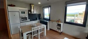 Η κουζίνα ή μικρή κουζίνα στο Casa Ricucho VUT-PO-00132 +41 φωτογραφίες