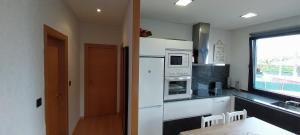 Η κουζίνα ή μικρή κουζίνα στο Casa Ricucho VUT-PO-00132