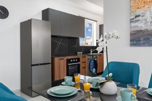 Η κουζίνα ή μικρή κουζίνα στο Modern 2BR Apartment Near Ayia Napa - Anastasia 101 +6 φωτογραφίες