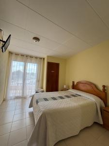 Postel nebo postele na pokoji v ubytování Pensio l'Avi Pep