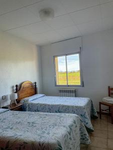 Postel nebo postele na pokoji v ubytování Pensio l'Avi Pep