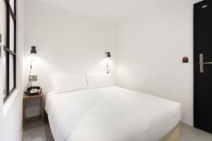 Voodi või voodid majutusasutuse ART'OTEL Ximending TAIPEI toas