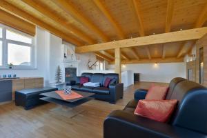 Χώρος καθιστικού στο Alpenchalets Wilder Kaiser