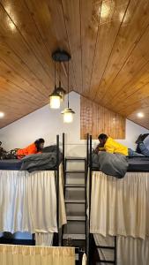 Postel nebo postele na pokoji v ubytování Hostelgia