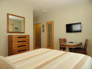 Postel nebo postele na pokoji v ubytování Viscay Hotel + 10 fotografií
