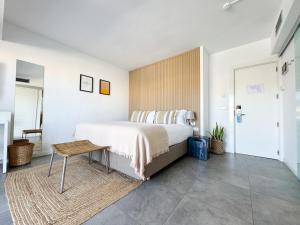 Ένα ή περισσότερα κρεβάτια σε δωμάτιο στο Hotel Boutique Villamor - Only Adults +37 φωτογραφίες