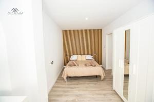 Postel nebo postele na pokoji v ubytování Deluxe Tropicana Rest and Pool