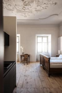 Postel nebo postele na pokoji v ubytování Ansitz Thierburg Suites