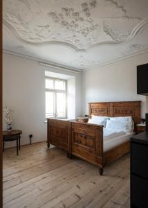 Postel nebo postele na pokoji v ubytování Ansitz Thierburg Suites