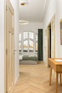 Ένα ή περισσότερα κρεβάτια σε δωμάτιο στο Apartament Rynek 75