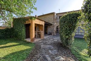 En have udenfor Villa con encanto Jardín, Wifi y Ac