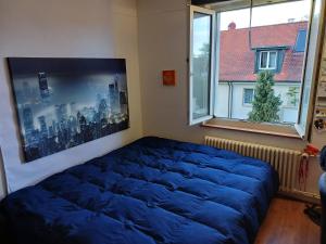 Ένα ή περισσότερα κρεβάτια σε δωμάτιο στο Stylish Flat 10 Minutes to Basel City Center