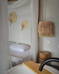 Ein Bett oder Betten in einem Zimmer der Unterkunft Bohemi Villa&Bungalov