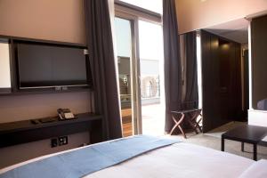 Voodi või voodid majutusasutuse S Stay Dongtan Hotel toas