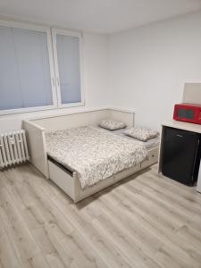 Postel nebo postele na pokoji v ubytování Apartmán Vespa + 15 fotografií