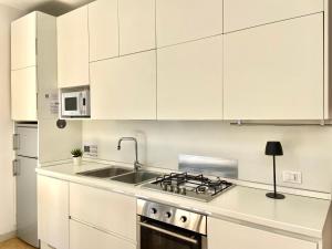 Kuchyň nebo kuchyňský kout v ubytování Civico 148- Lido di Jesolo - Per Famiglie