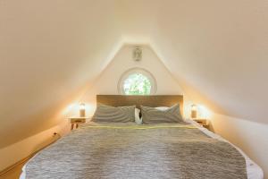Ένα ή περισσότερα κρεβάτια σε δωμάτιο στο Haus Ostseenixe 05