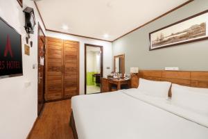Postel nebo postele na pokoji v ubytování A25 Hotel - 45 Phan Chu Trinh + 10 fotografií