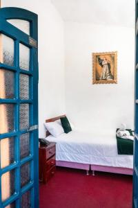 Postel nebo postele na pokoji v ubytování Rituales Inn Cusco - San Blas