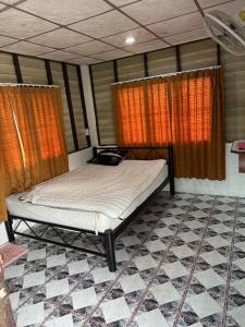 Postel nebo postele na pokoji v ubytování Ao Nang Small room