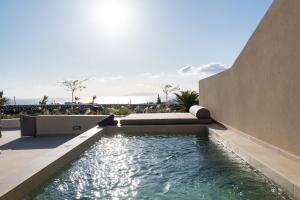 The swimming pool at or close to Illusion Suites