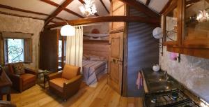 a room with a bed and a sink in a room at Ca' dea Gondola in Sarmede
