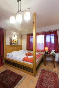 Łóżko lub łóżka w pokoju w obiekcie Villa Cynamon