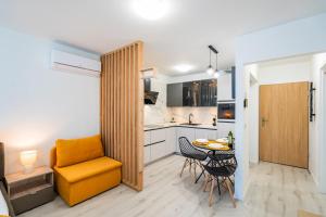 Køkken eller tekøkken på MyFlat Wave Beach43 Apartment