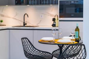 Køkken eller tekøkken på MyFlat Wave Beach43 Apartment