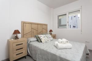 En eller flere senge i et værelse på AT Albornés I + 8 billeder