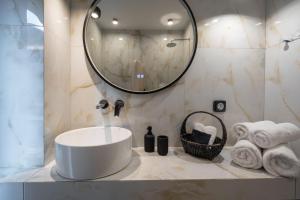 A bathroom at Illusion Suites