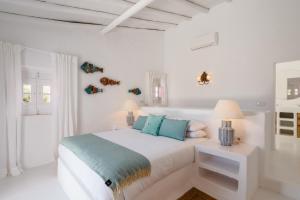 En eller flere senge i et værelse på Casa da Encosta