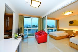 Postel nebo postele na pokoji v ubytování Modern Thai Suites