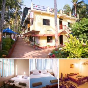 een hotel met 2 bedden en een gebouw bij Panchavadi Ayurvedic Beach Resort in Varkala