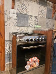 an oven with some food inside of it at Baraa house in Cairo