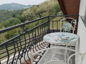 a table and chairs on a balcony with a view at Holiday Home Martin in Varaždinske Toplice