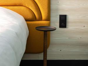 Postel nebo postele na pokoji v ubytování ibis Styles Brugge Centrum