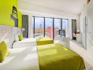 Posteľ alebo postele v izbe v ubytovaní Ibis Styles Wroclaw Centrum
